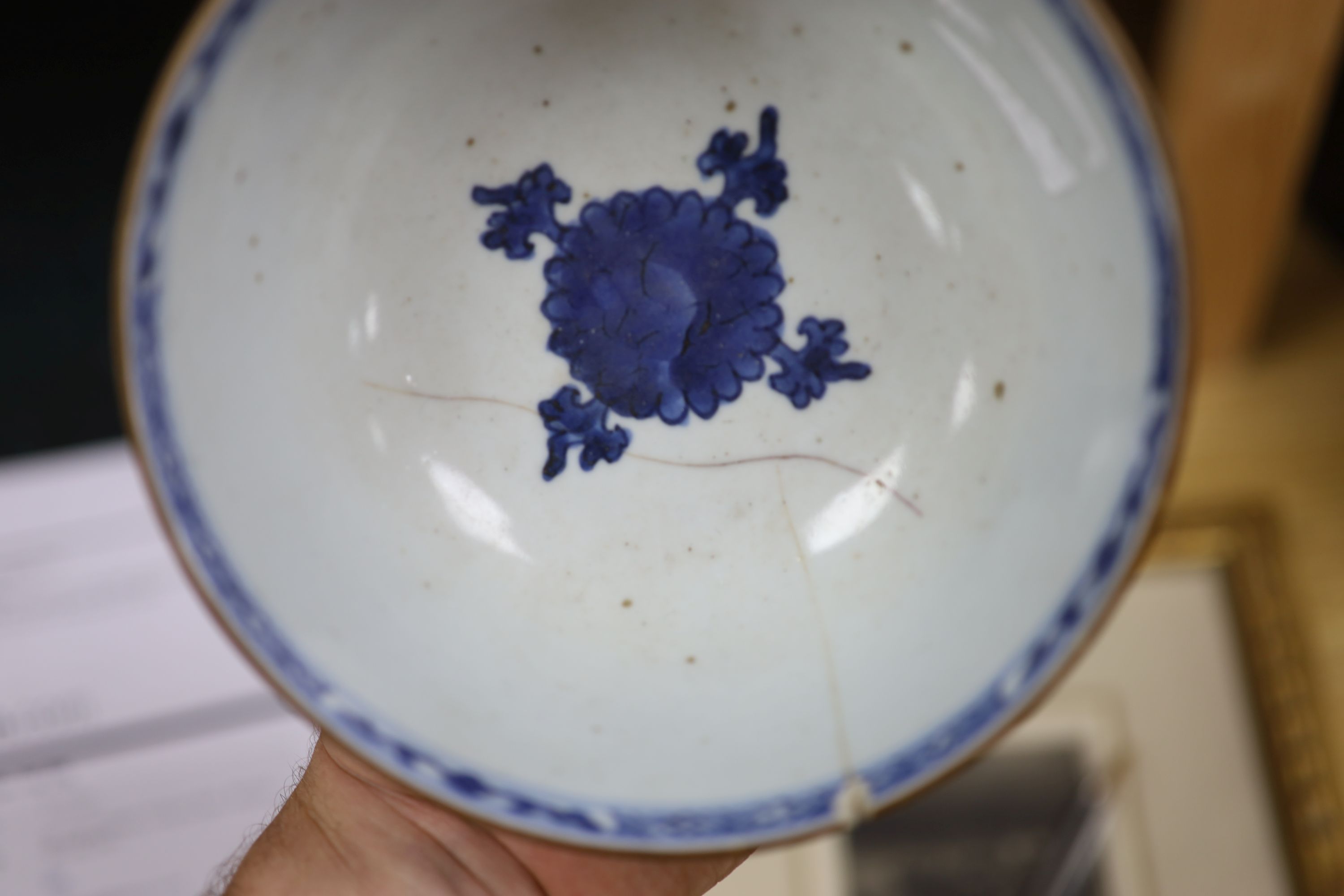 A Chinese blue and white bowl, diameter 15cm, a tea bowl and saucer, a crackleglaze shell dish and a celadon glazed stem cup